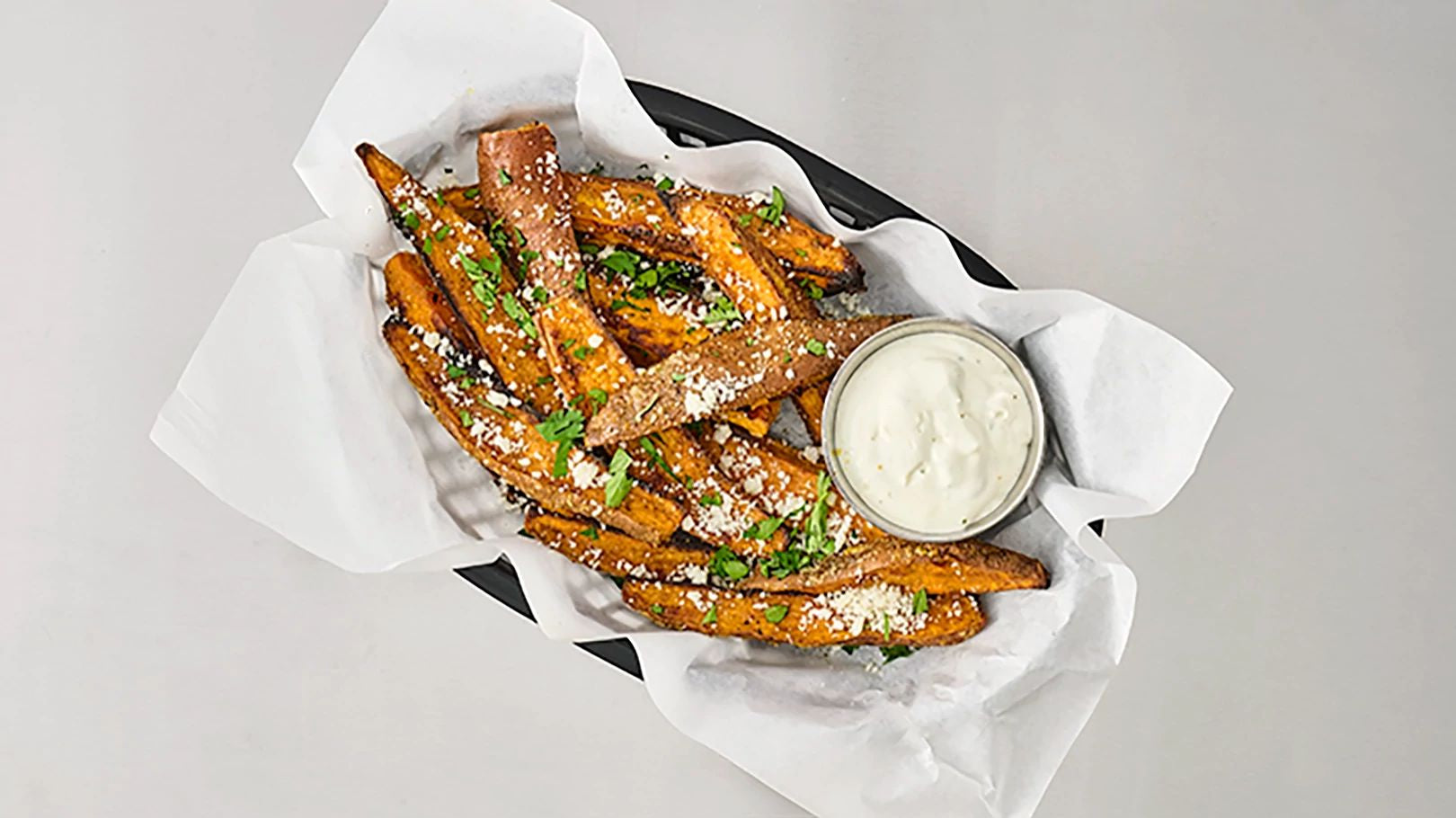 Adobo Sweet Potato Wedges with Lime Crema