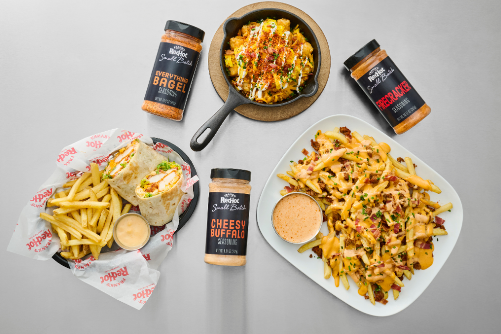 Plates of food with Frank's Redhot Small Batch Products on a gray background